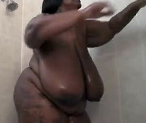 This Massive ebony damsel milks in the shower. Her ginormous